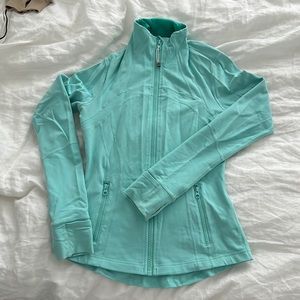 Lululemon size 6 turquoise blue zipup with thumb holes, pockets, and vented back